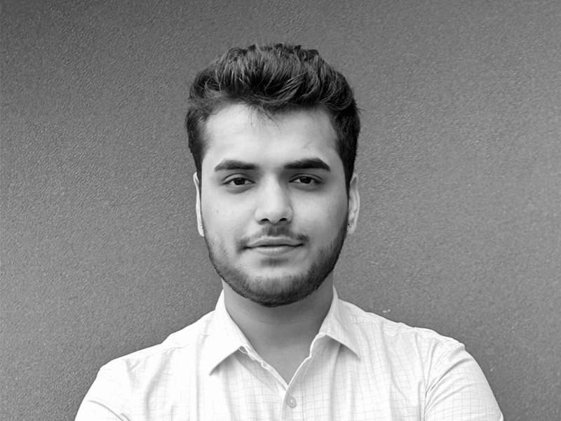 Harshit Verma's headshot in black and white